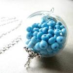 Hollow Glass Pendant Filled With Aqua Beads On A..