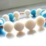 Blue Tagua Nut And Wood Beaded Stacking Stretch..
